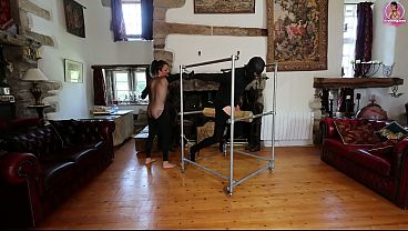 Whipping on Wooden Bondage