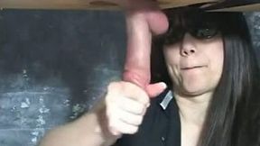 Wanking the dick of my husband through a hole on the table