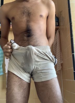 Hairy boy rubs, pees shorts and cums after