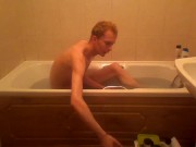 Blonde teen takes a warm bath in the bathtub