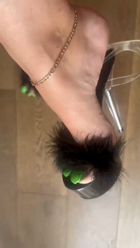 Bright green long toenails