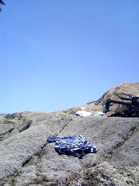 Masturbating on the beach