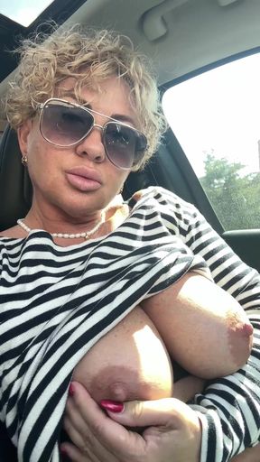 Mature solo milf shows off her tits and boobs