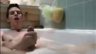 Twink jerking off in bathtub 9