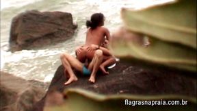 Young people having sex on the beach in Brazil