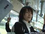 Hot asian babe in bus gets her body gently touched by two guys in front of everybody.