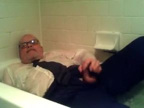 pants shirt and tie and shoes and socks in tub with cum