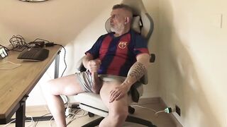 Mature parent with large wood frolicking at his desk