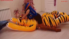 Alla wears a beach ball in leggings and hotly rides on an inflatable tiger and an inflatable whale, getting real pleasure