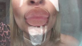 SMEARED CHOCOLATE LIPS ON THE GLASS