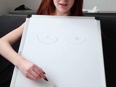 Lovely redhead showing off her perky titties on webcam