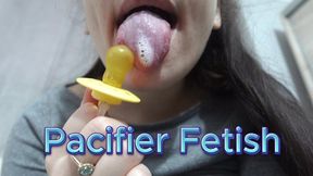 Indian Stepsister really likes the pacifier so she sucks it, licks it with lots of saliva and then puts the pacifier to her big breasts