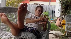 Cute Granny Taking Dirty Socks Off And Showing Her Lovely Mature Feet Outdoors