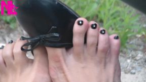 Shoeplay with Black Leather Flats on Barefoot Outside