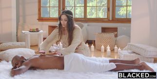 Gorgeous brunette spins massive black rod in surreal interracial