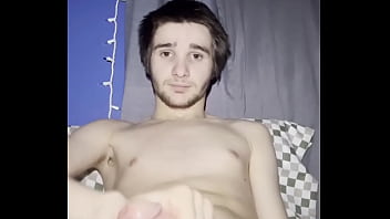 Twink oils up his cock and plays with it!