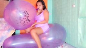 Srxy Juju Blows To Pop Huge Boom Balloon While Riding A Cattex Longneck Balloon.