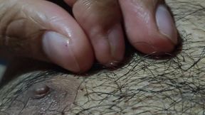 Handsome boy fingering hairy cock
