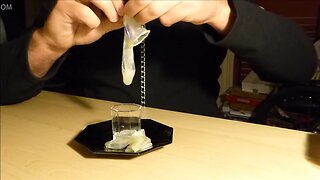 Drinking spunk from two condoms