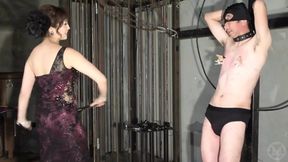 The Dick Spins Like a Top. the Mistress Pulls the String Wrapped Around the Slave&#039;s Dick in One Go, Spinning It Like a Top