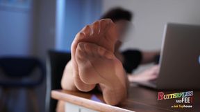 Teasing you with my nyloned seamed soles and feet during my work