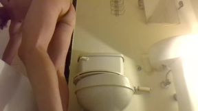 Stroking While Smoking, on a Toilet