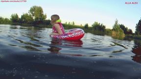 Alla swims on the lake and wears an inflatable vest and plays with an inflatable ring!!!