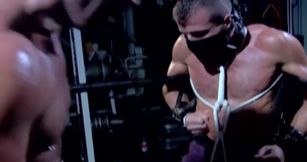 Muscular male slave is captive and set to endure merciless cock in ass