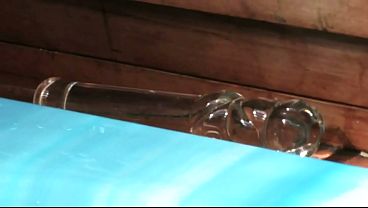 Red streaked brunette wearing a skull bikini gets off in jacuzzi on water jets and with...