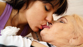 Sexy brunette licking out a chubby grandma