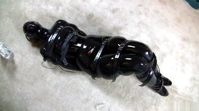 Full-body latex bondage session with electrostimulation and strapon tease