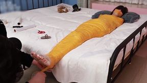 Cute girlfriend binds herself with tape for foot play