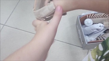 Summer shoes to try on in the shoe store