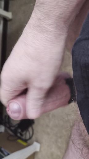 My Friend Sits in a Chair and Jerks His Cock While Watching the Video Until He Orgasms