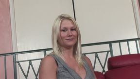 Blonde with round huge boobs licking her tits to seduce you