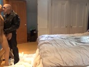 leather man wearing pantyhose has fun with pantyhosed encased jock doll
