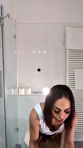 Petite brunette babe in light hot mini skirt gets bored and ignored in the bathroom   Clip 1