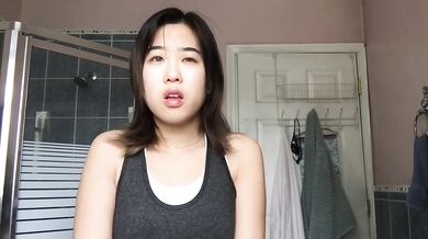 Asian girl loses control wets her shorts panties with pee desperation