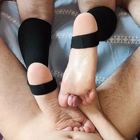 Footjob with stirrup socks