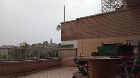 On the Terrace, in the Rain
