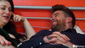 Busty Tattooed MILF Engages in Hardcore Session with Partner