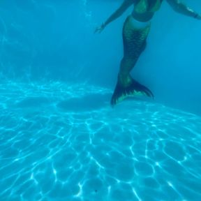 Mermaiding at the resort with bonus footage of bikini strip down