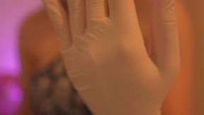 The stepsister shows both of her gloves because she has a glove fetish. One glove is a yellow dishwashing