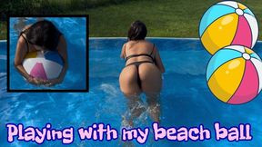 Playing with my beach ball in the pool