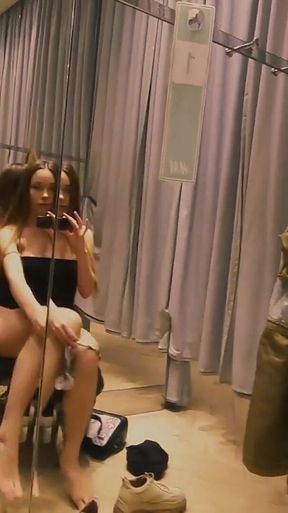 Teen Beauty Masturbating in the Fitting Room