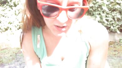 Dirty piss-filled diaper shown in a public garden under a white skirt