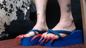 Extreme long long red toenails