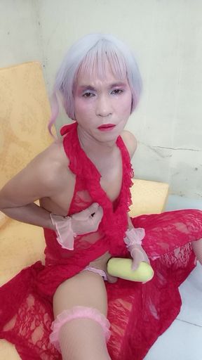 Transgender Le Wearing a Sexy Dress Erotic Masturbating with a Fake Can