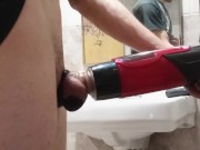 In the public laundromat using my automatic masturbator