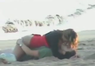 Horny Spanish couple having quick sex on the public beach